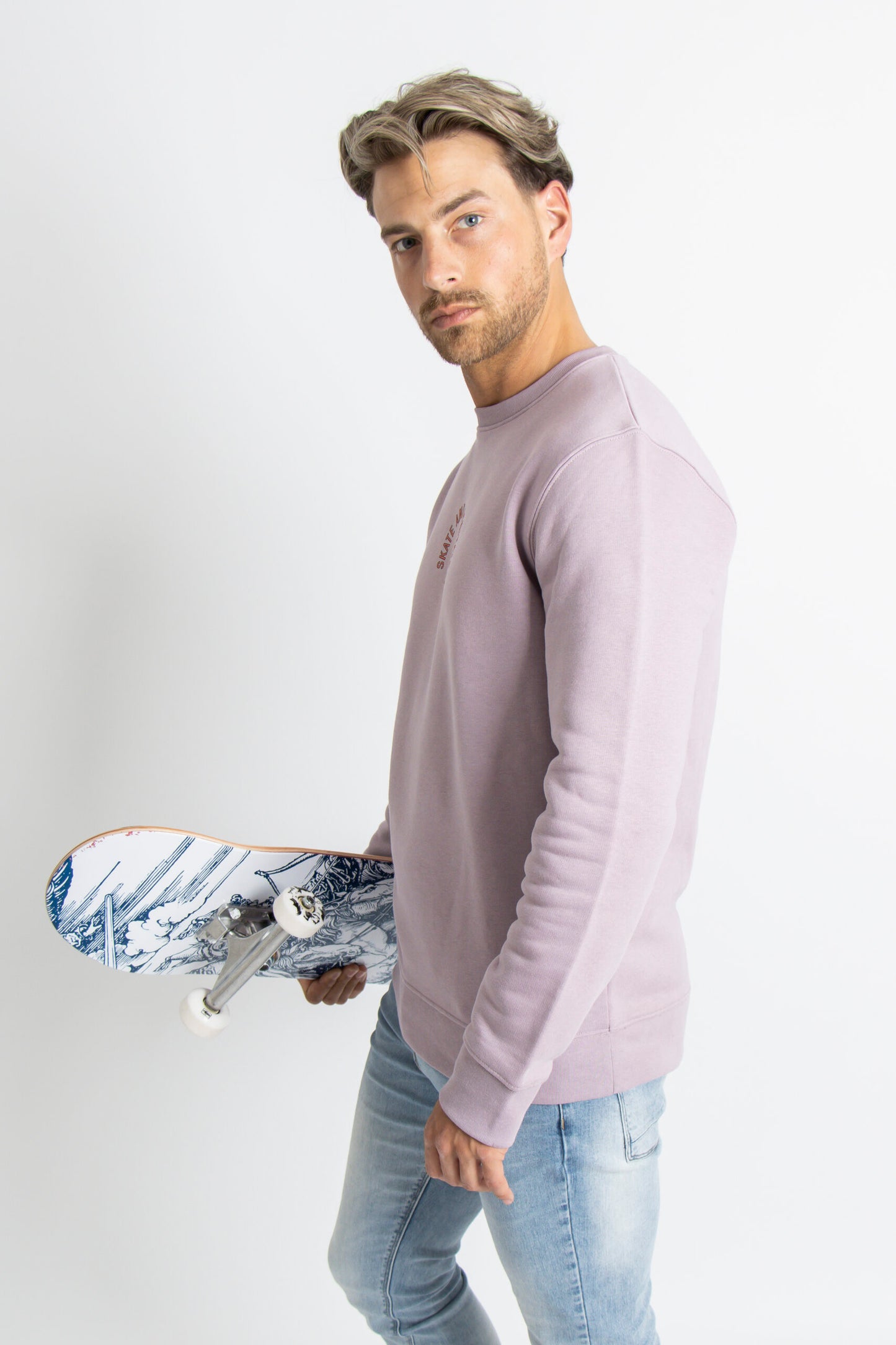 'Skate and meditate' mauve sweater